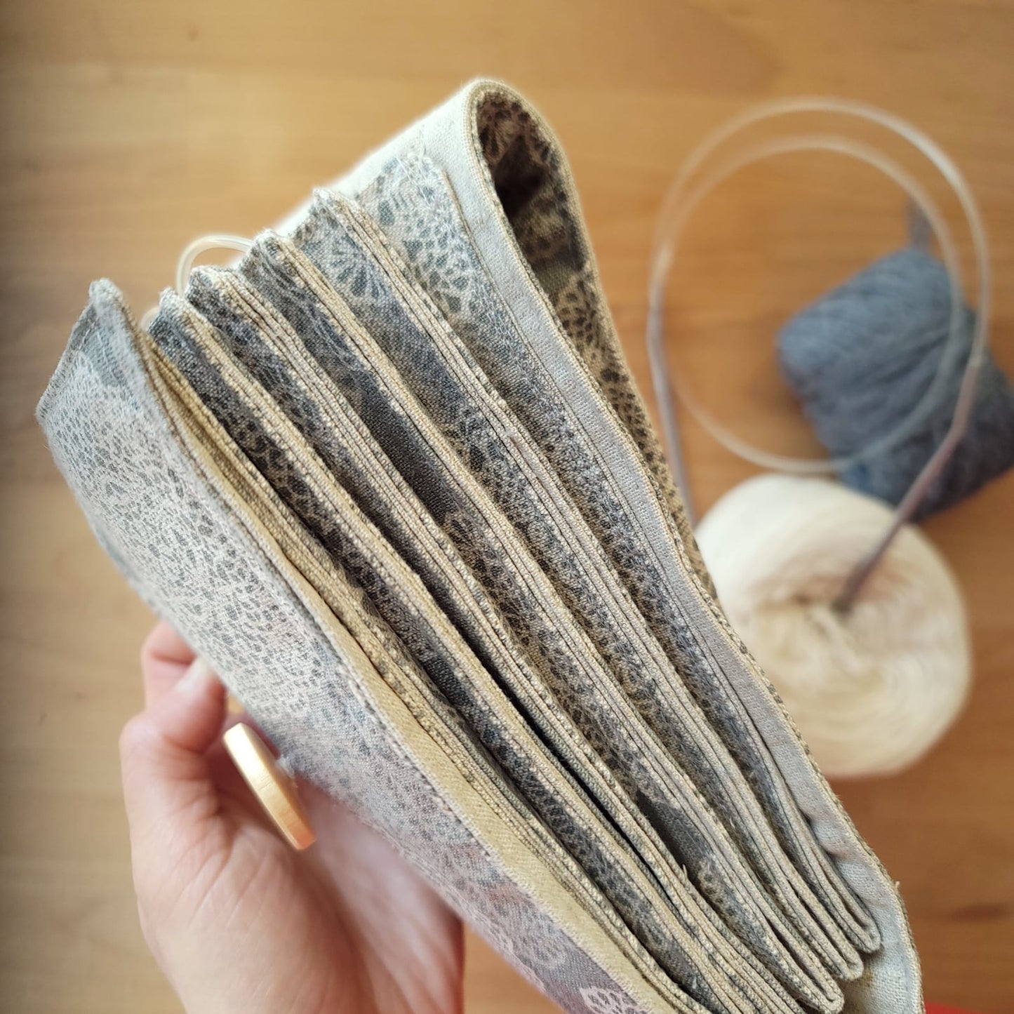 Circular knitting needle case with a zipper pocket in snow flower patters