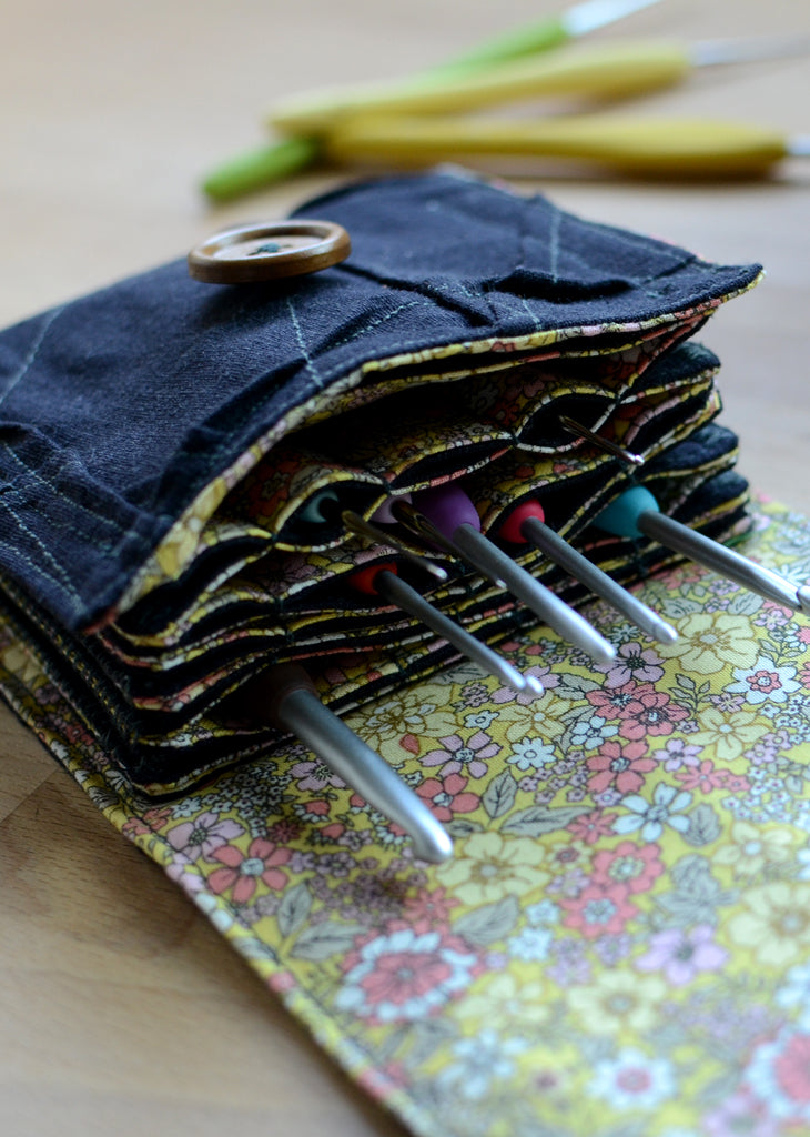 The most innovative crochet hook organizer. All sizes of crochet hooks, darn needles, tailor rulers, scissors, and stitch markers can stay all together in this fabulous crochet hook storage.