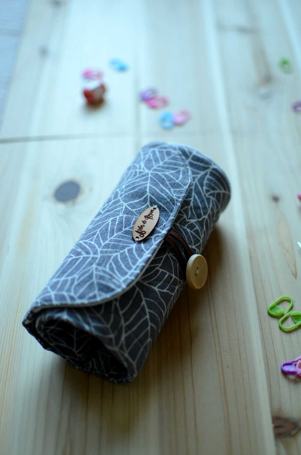 Crochet hook storage in natural linen with a built-in zipper pocket