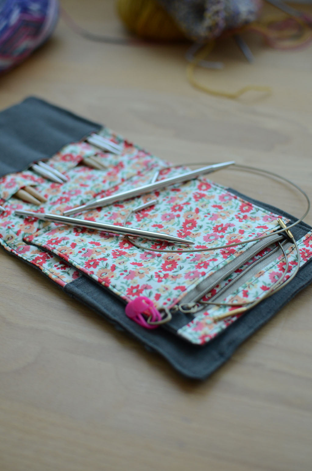 Travel knitting needle holder that carries all your knit necessities and more. Perfect summer vacation knitting bag.